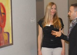 Art exhibition with artist Tanja Groos and attendee