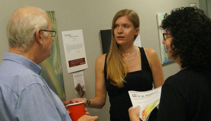 Art exhibition with artist Tanja Groos and attendees